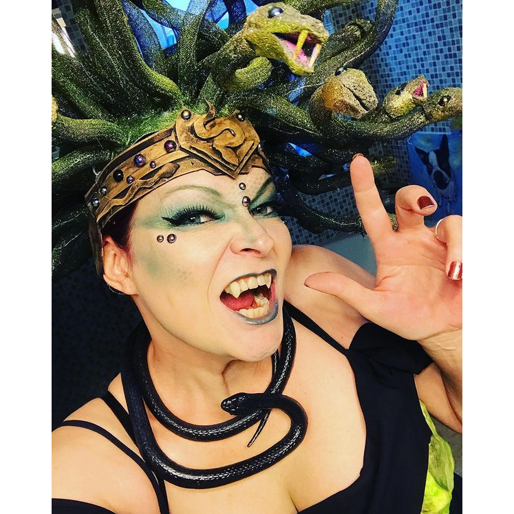 Headdress, fangs, makeup - check!