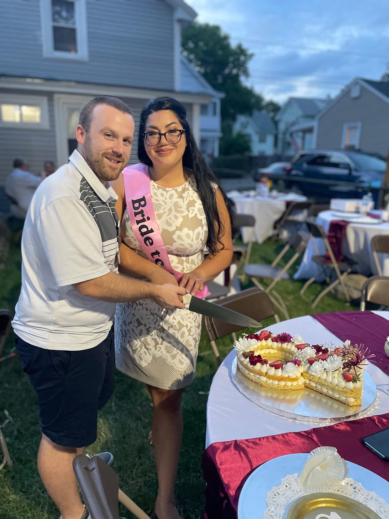 Engagement party cake cutting.
