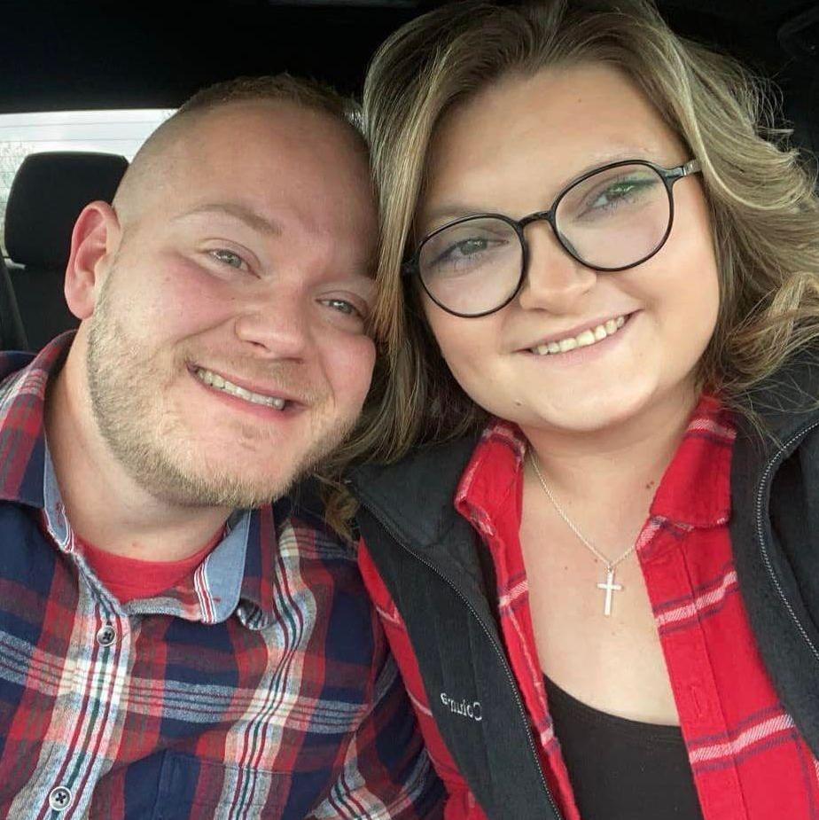 Pre-Church car selfie. Dustin has a Chief's shirt on under the flannel.