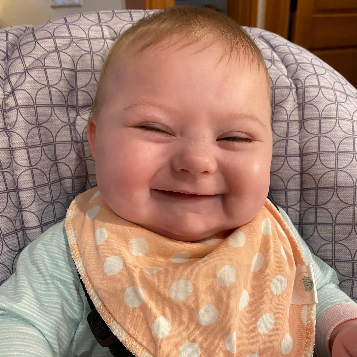 We cannot get enough of our little smiley happy baby, Gracie. Look at that SMILE! - circa 2020