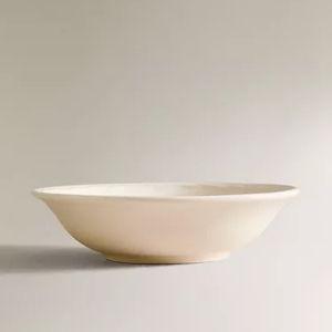 EARTHENWARE BOWL WITH RAISED-DESIGN EDGE