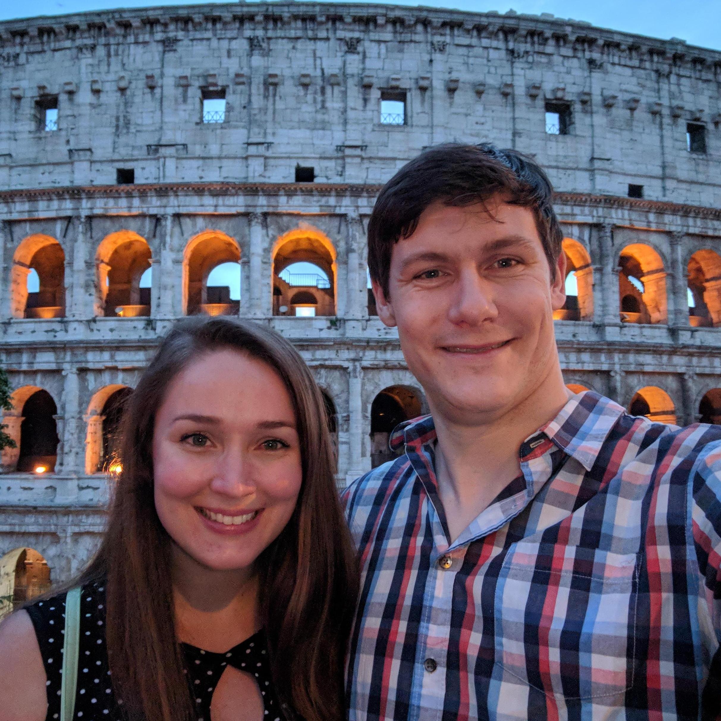 Admiring the Colosseum at dusk during our day in Italy, 2018