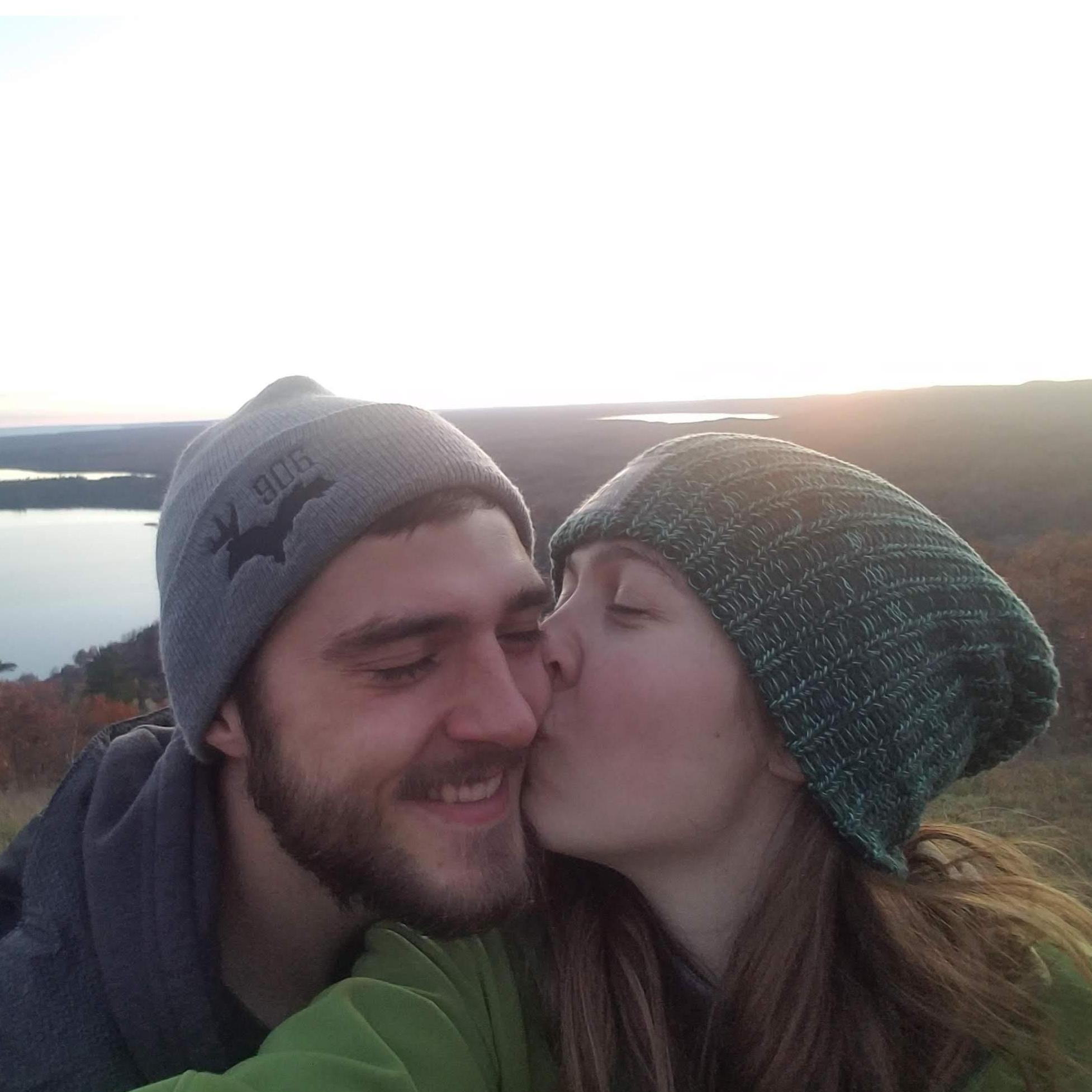 Standing at the top of Mount Bohemia (and the world) after Kyle's proposal.