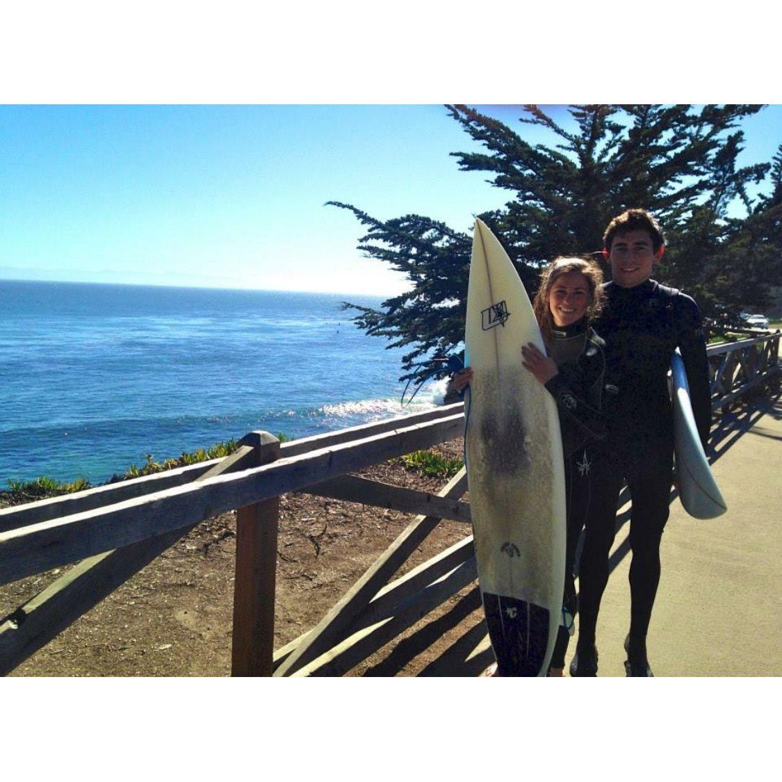 Our first 'date' in 2014- where Mari pretended to know how to surf... and could barely sit on the board.