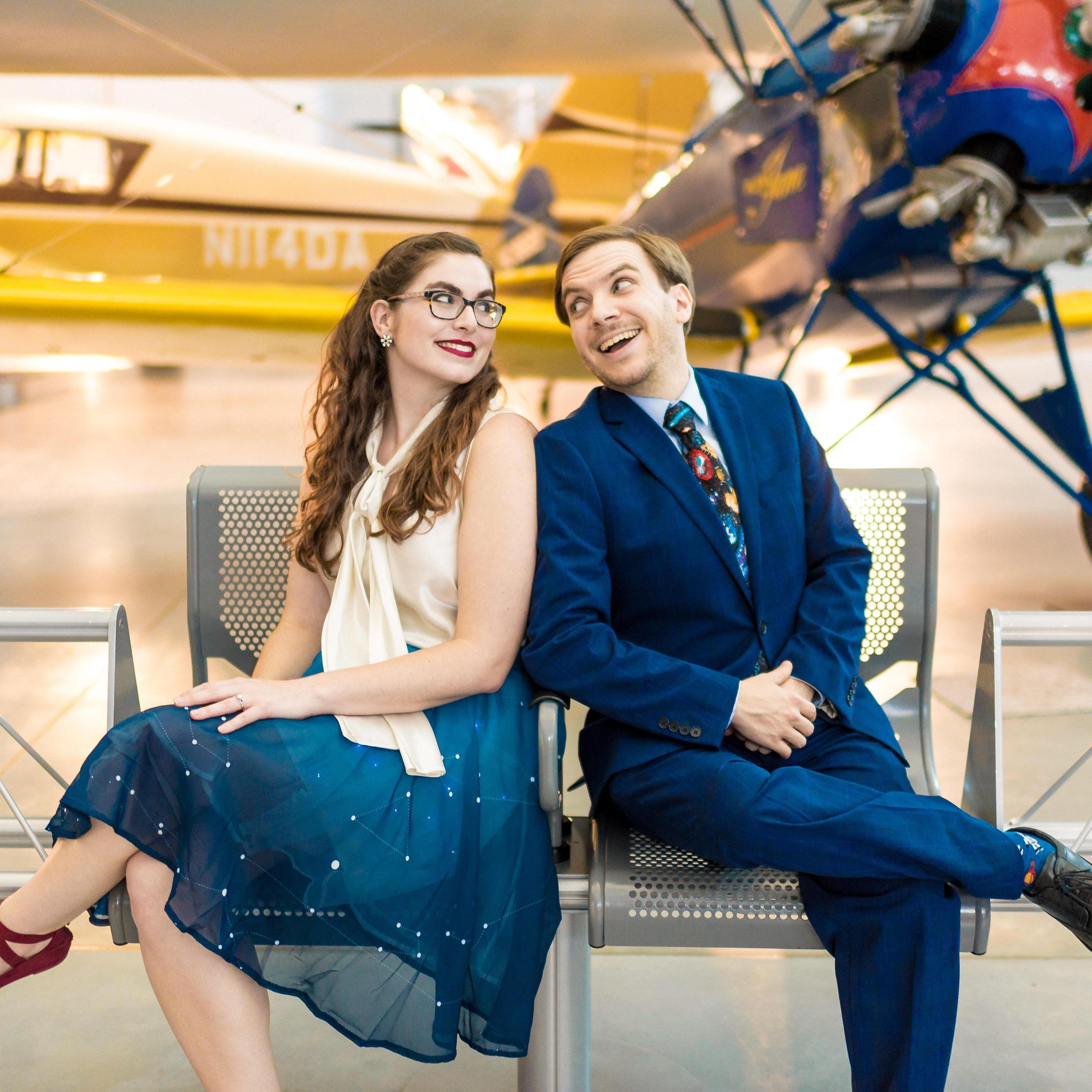 Sitting in front of the "Plane Woman."