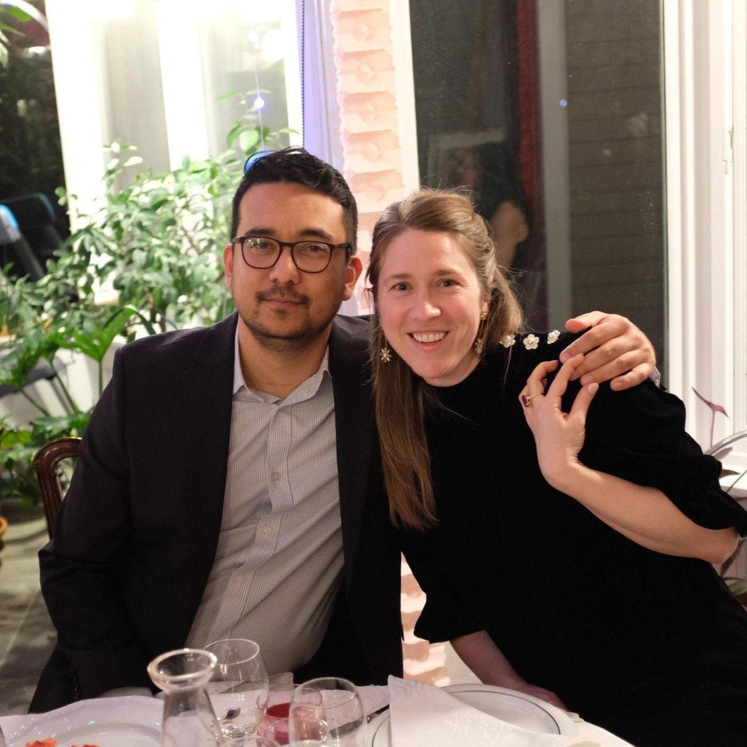 Photo of Shikhar and an unsuspecting Katie at her parents' 40th Wedding Anniversary party (the night before getting engaged).