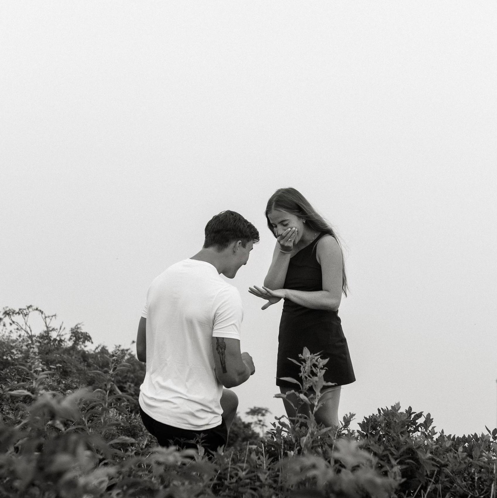 And it all led up to this! A proposal in the Blue Ridge Mountains. Both of our reactions to the ring on Kat's finger for the first time, as you can tell we were both very very excited. - Jon