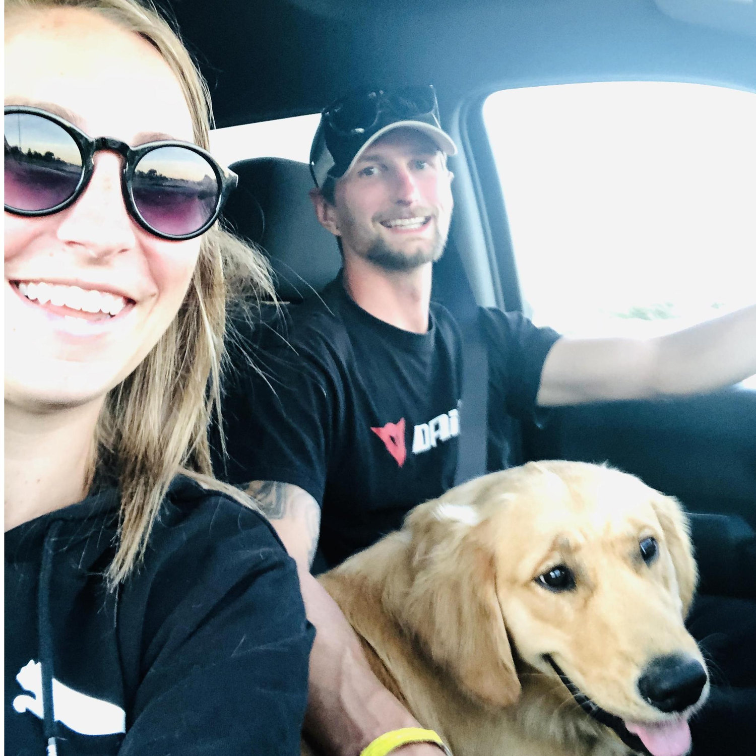 Tuck's preferred spot on road trips is in the front & in the middle!