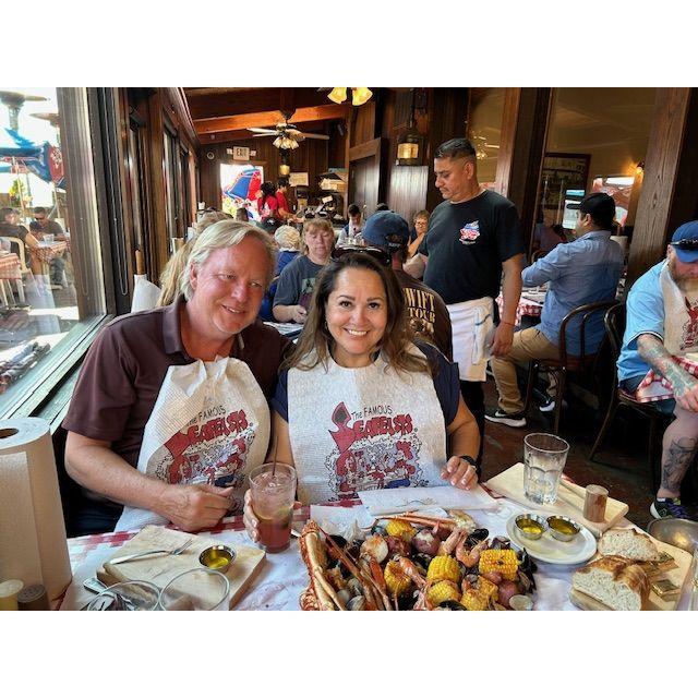 Seattle 2023 -- enjoying a delicious crab dinner with my high school best friend Terri and her husband Ernie