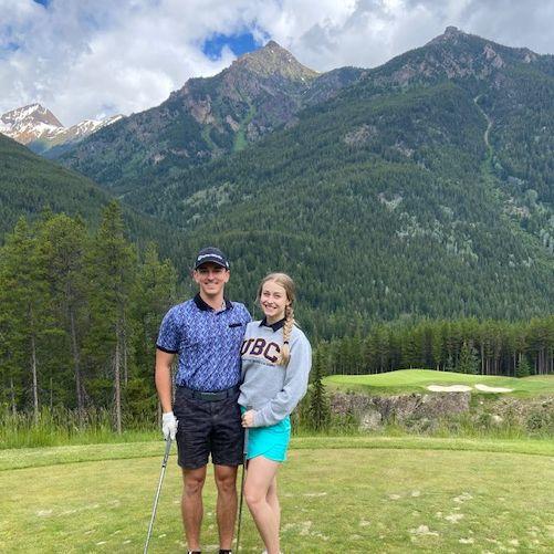 2022: Graduation golf trip! Carson is 3/3 on pars where Rachel and him take a photo.