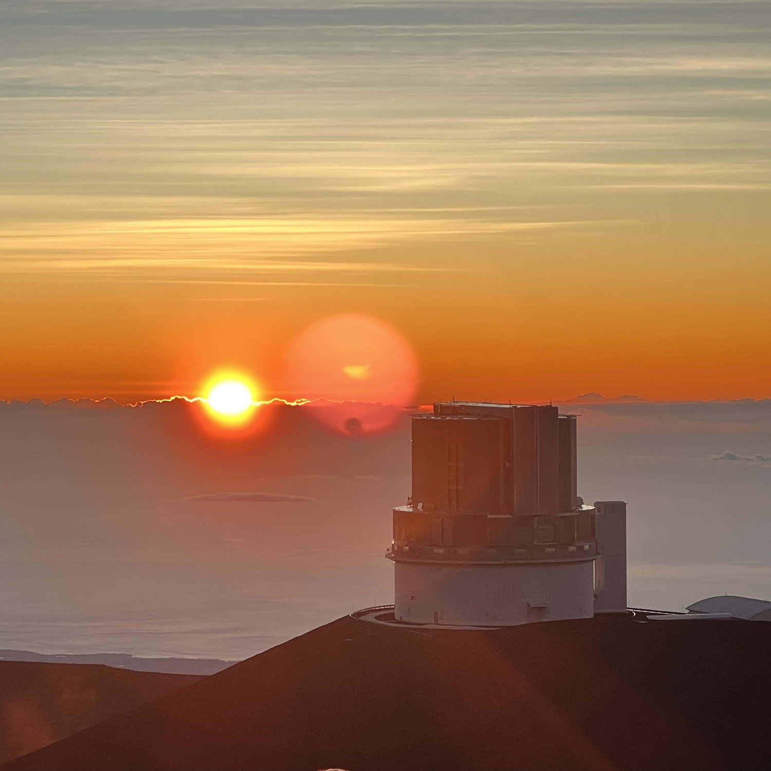 Zack proposed to Bryce atop Mauna Kea where several space telescopes sit on the highest peak in the world (when measured from the bottom of the ocean).