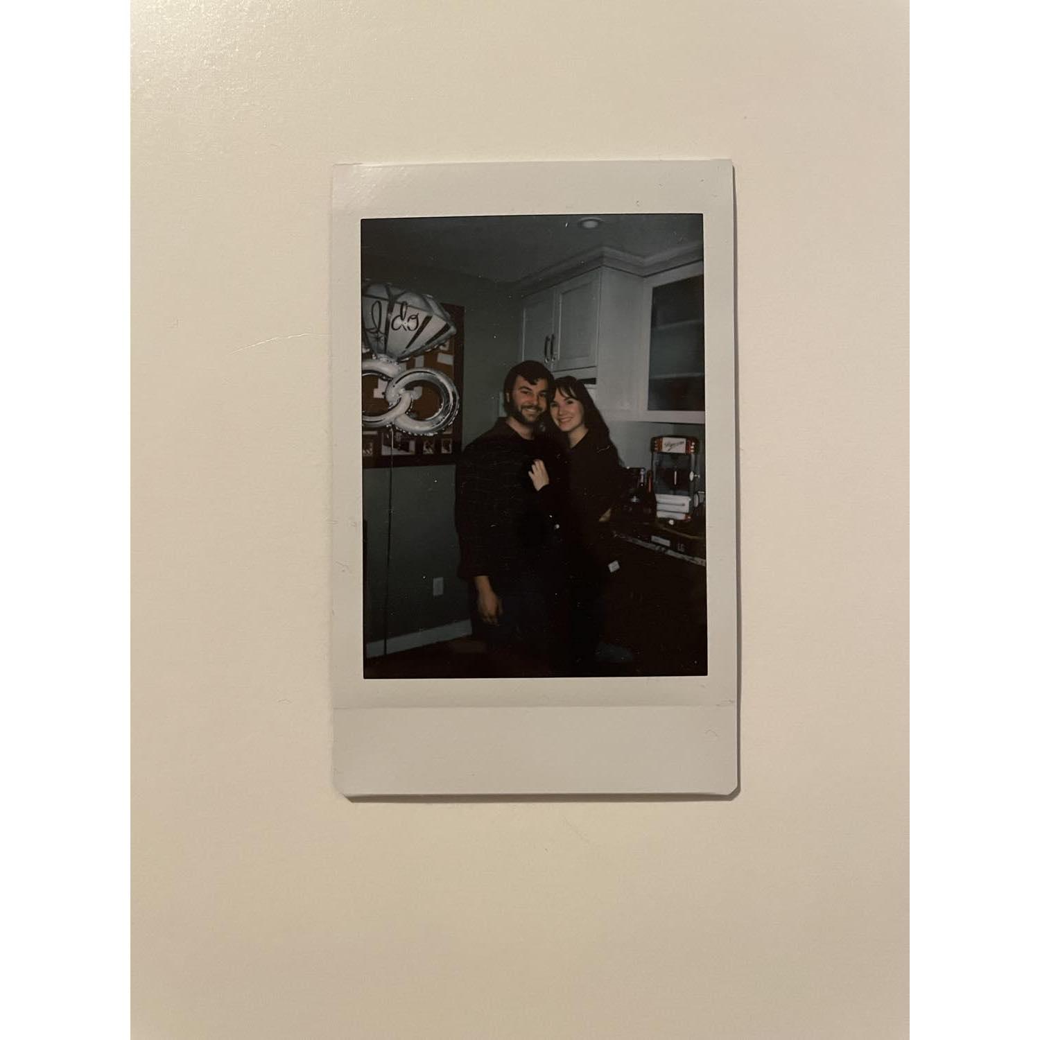 Poloroid from celebrating Christmas and our engagement with our friends