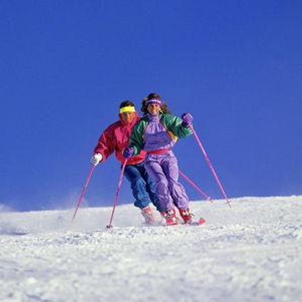 His & Her Downhill Skis
