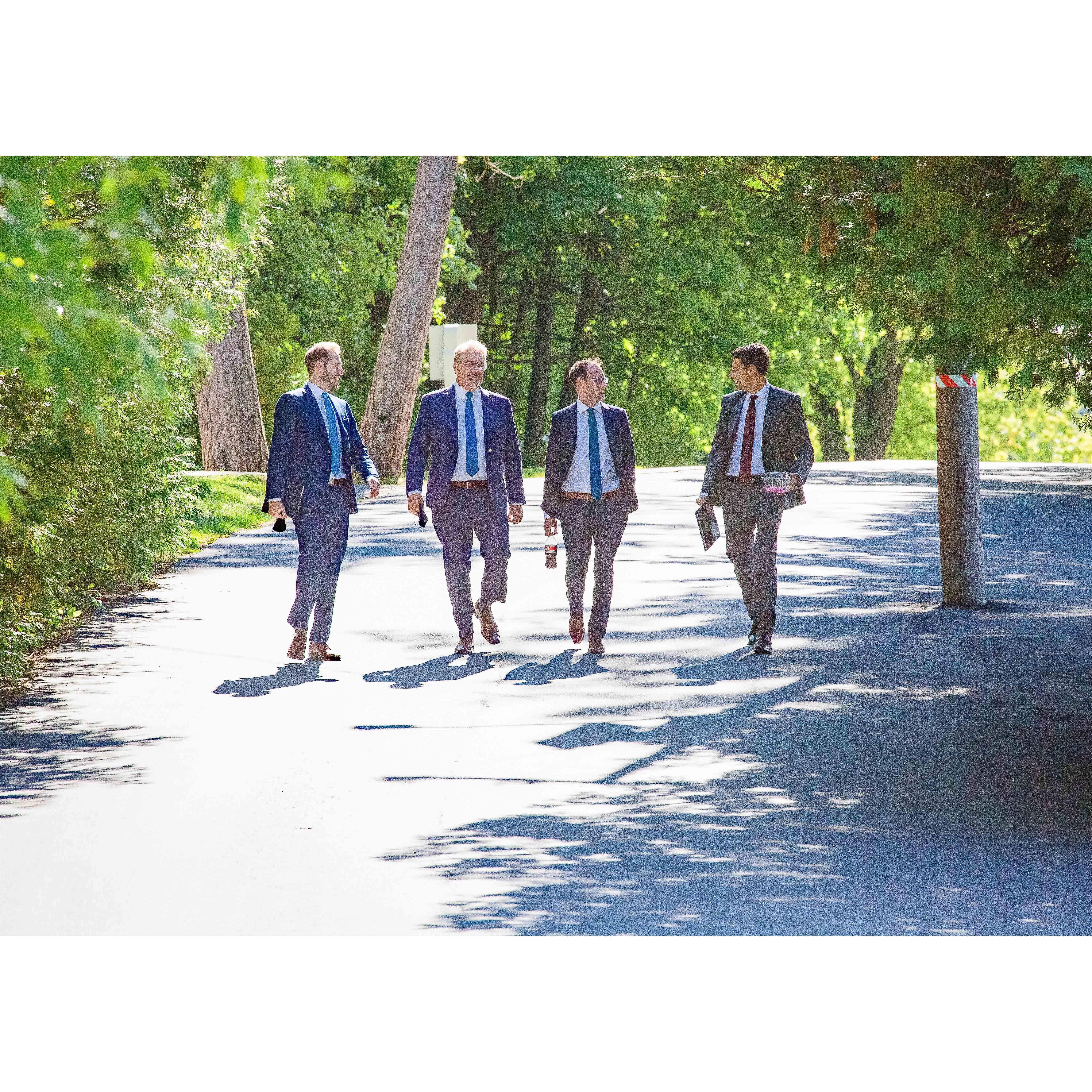 The boys walking over to the wedding site