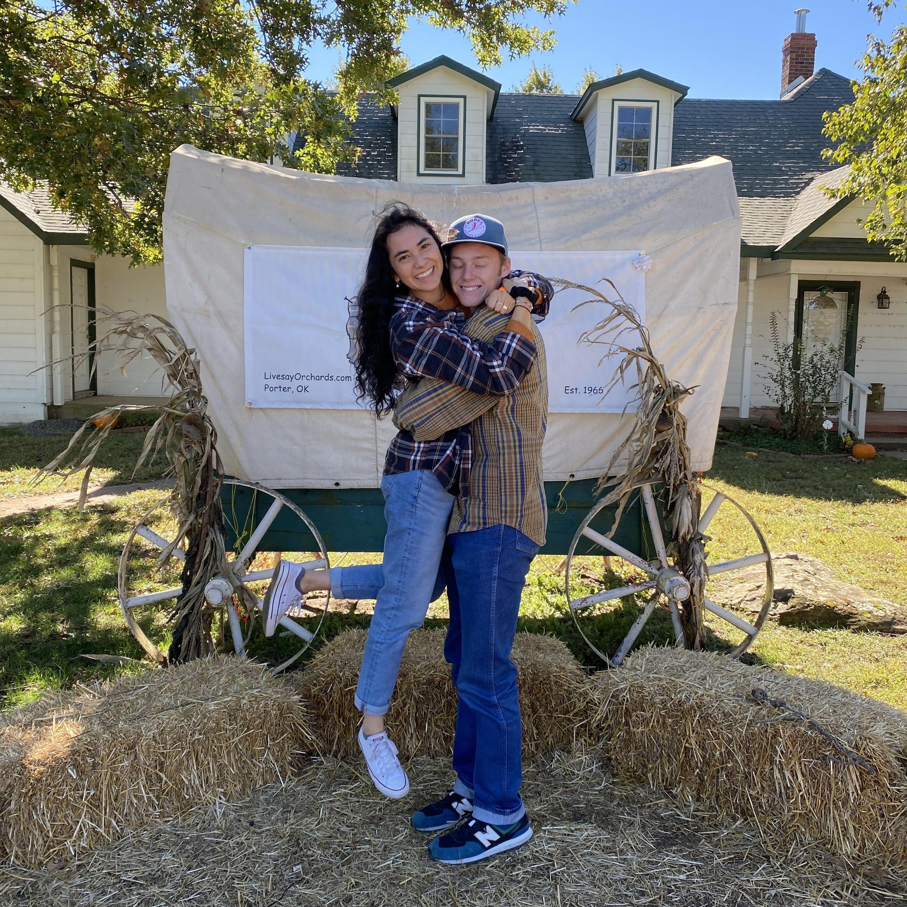 We went back to the pumpkin patch where we had gone on roommate date together. But we technically weren't dating. When we went back a year later, in this photo, we were dating!