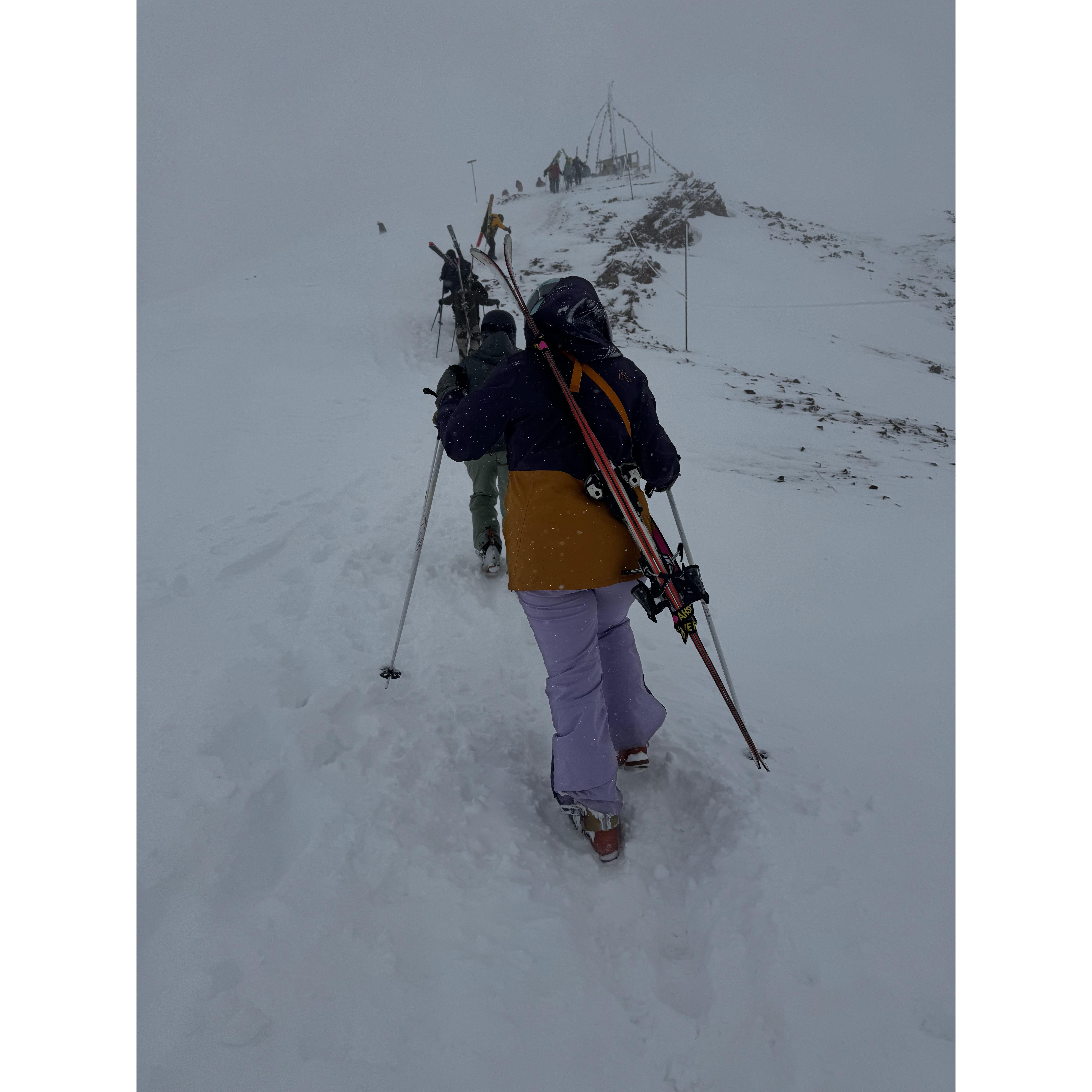 When you convince your friend from Georgia hiking to the top of a mountain with skis is fun.