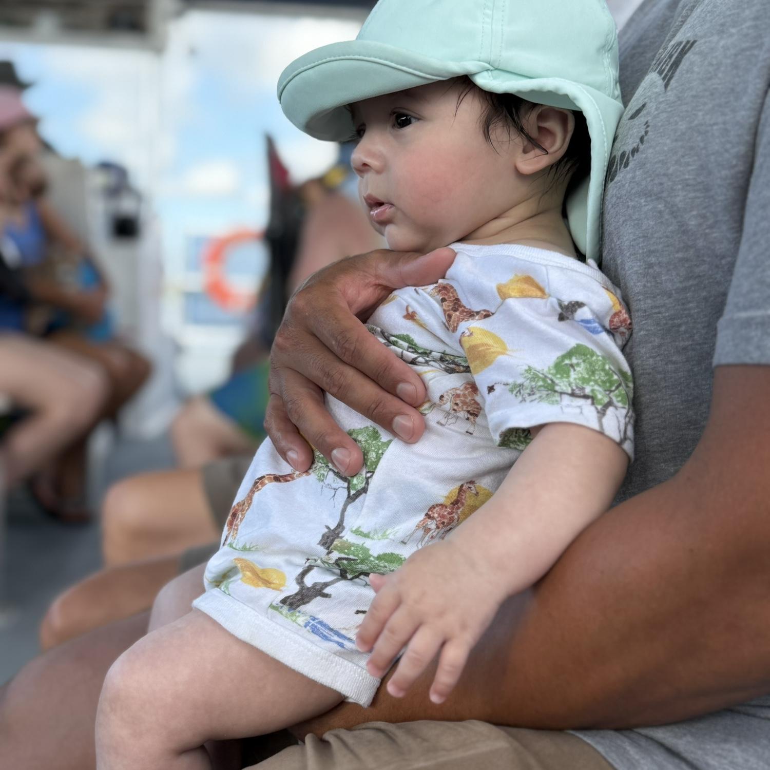 Daddy holding Baby Jeffrey on the ferry ride out to Bear Island!