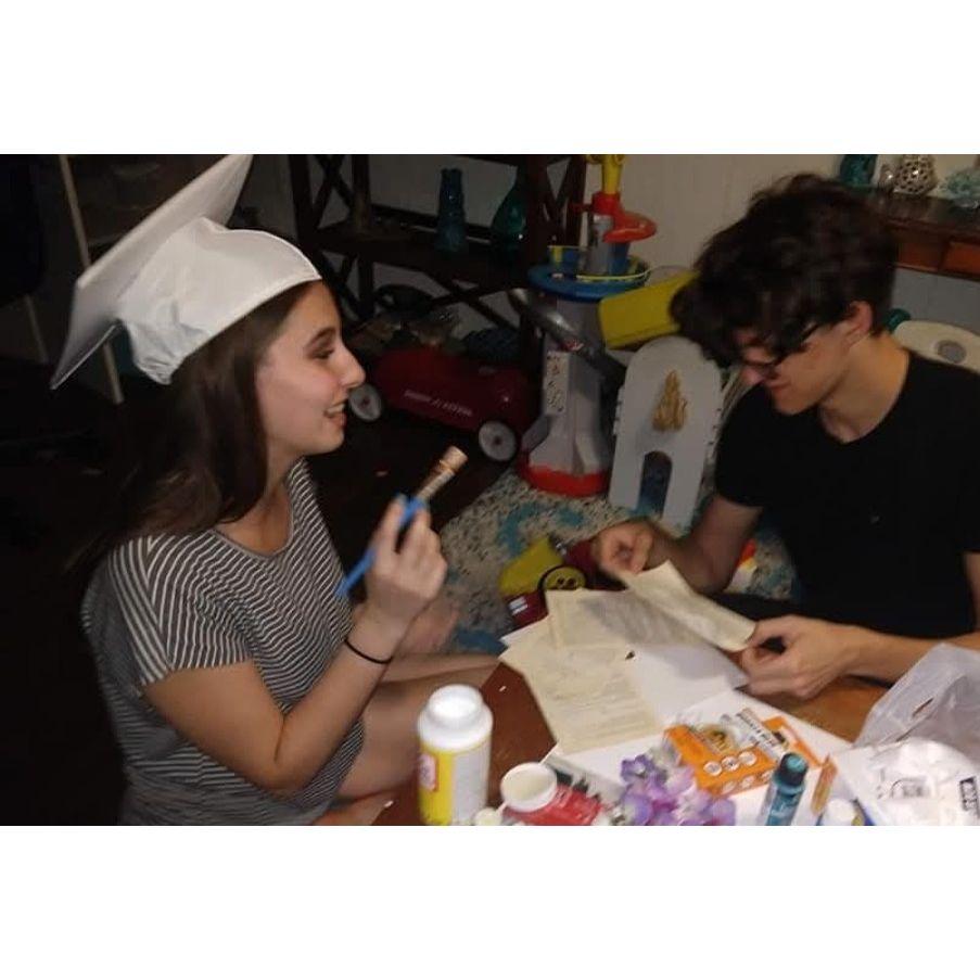 Decorating Allie's graduation cap!