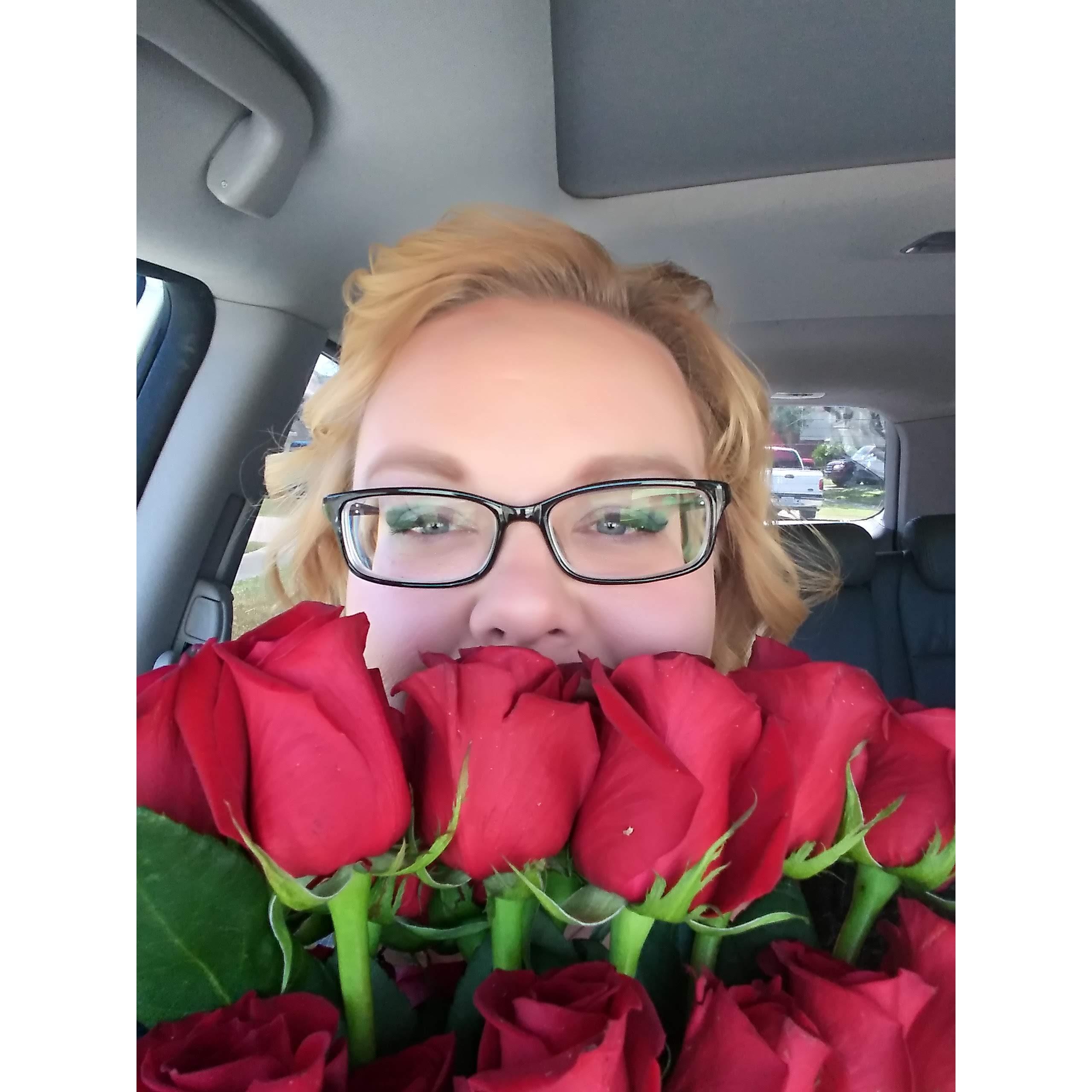 Terri got a bouquet of roses before the picture shoot.