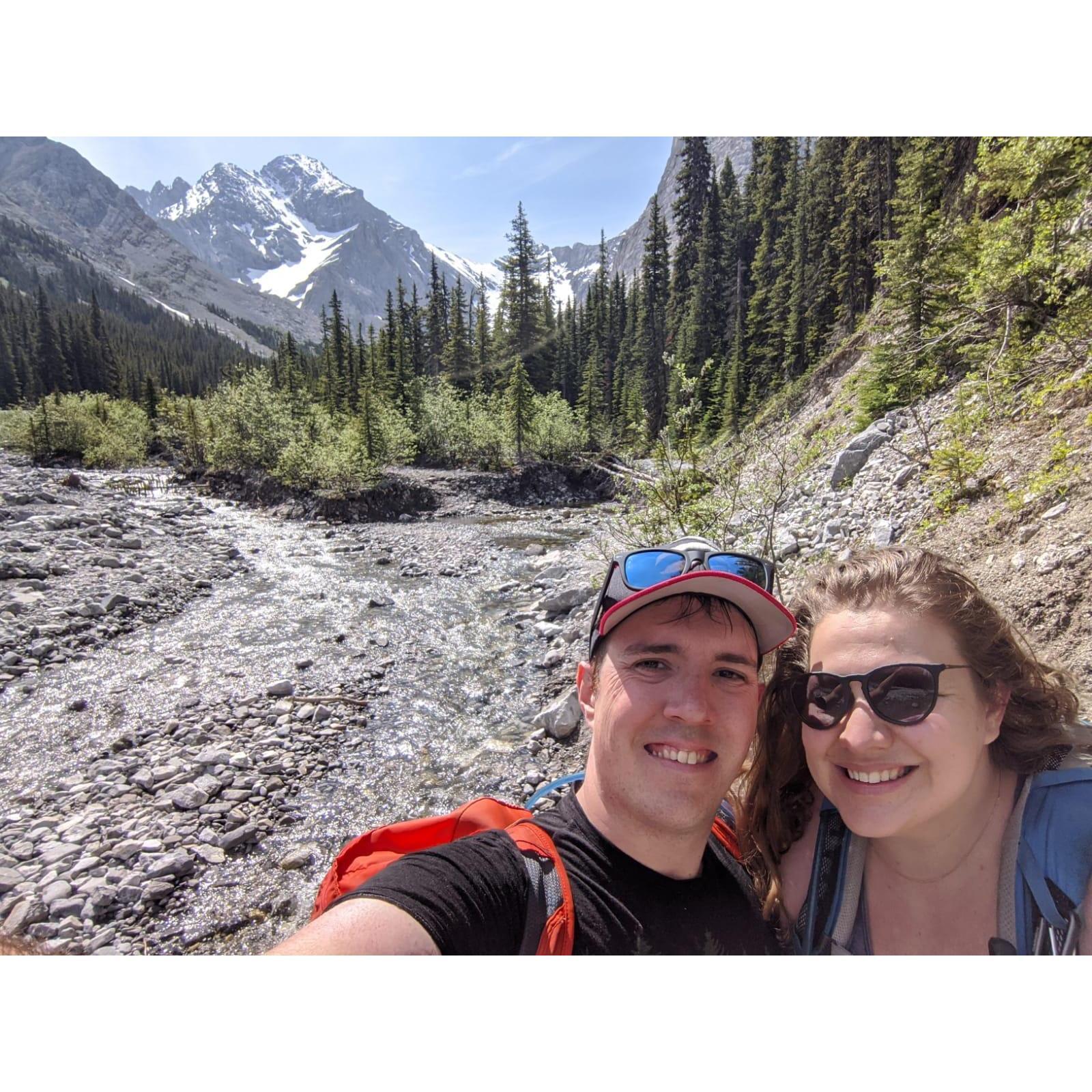 Brandon popped the question on a hike, what a beautiful day! July 11, 2020. He even packed a charcuterie board and our favourite grizzly paw drinks!