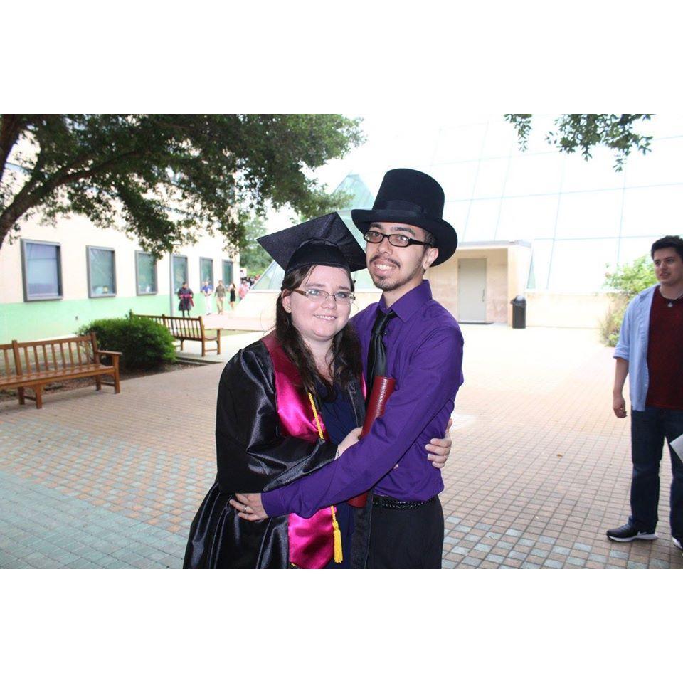 He insisted on wearing his top hat to Mindy's Bachelor's degree graduation.