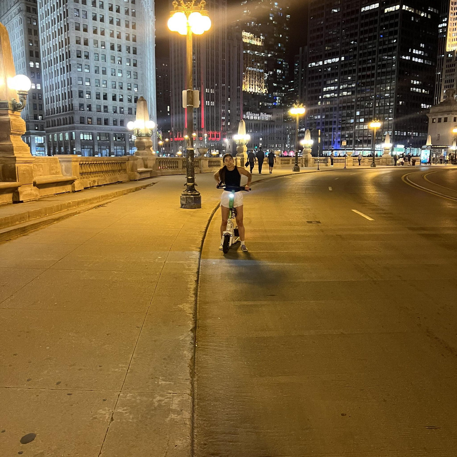 Jacob sneaking a photo of Katie the first time she ever scootered 😂  -- this was a month into dating and we were both too shy to just take a photo together😂