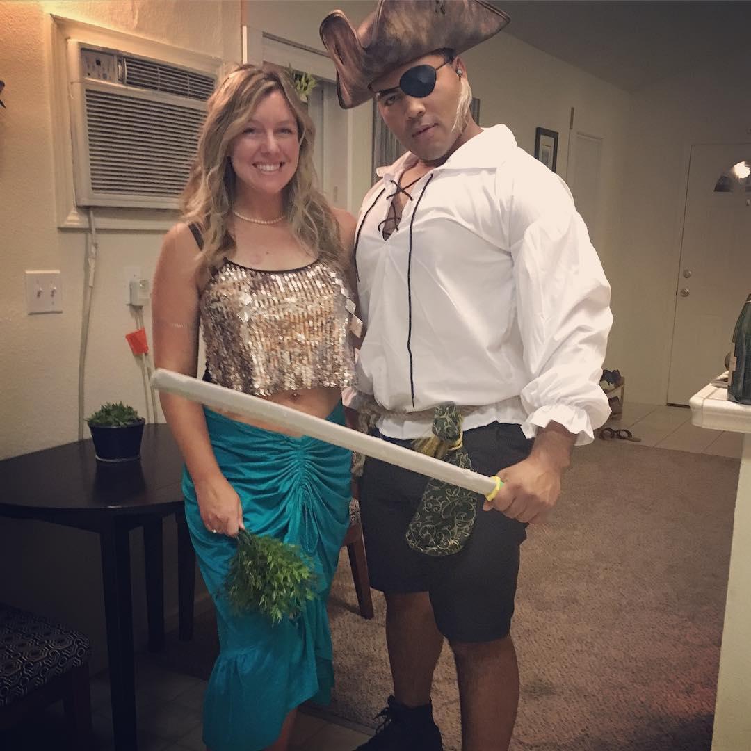 A pirate and his mermaid.