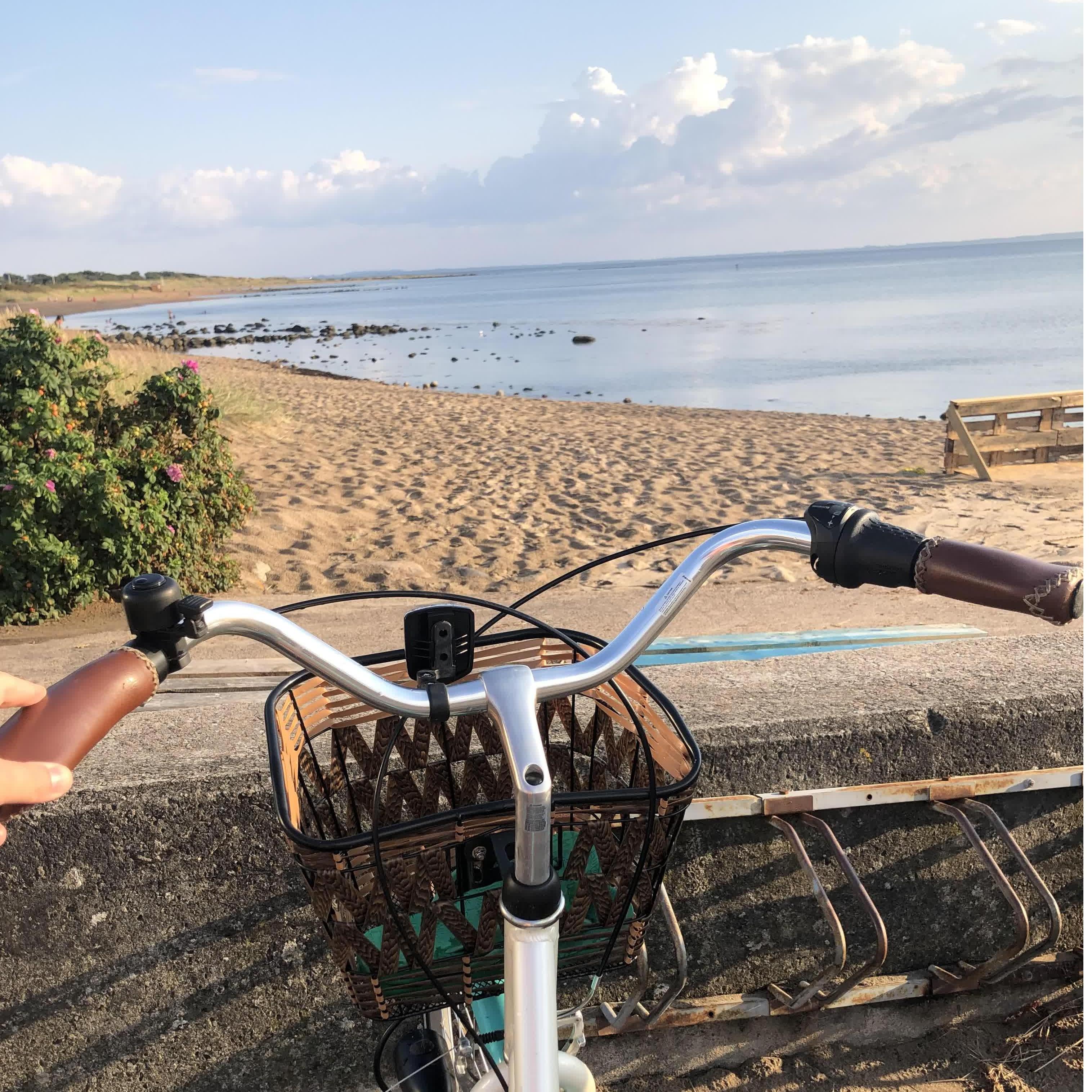 Park your bike at Strandhugget, the location for the reception