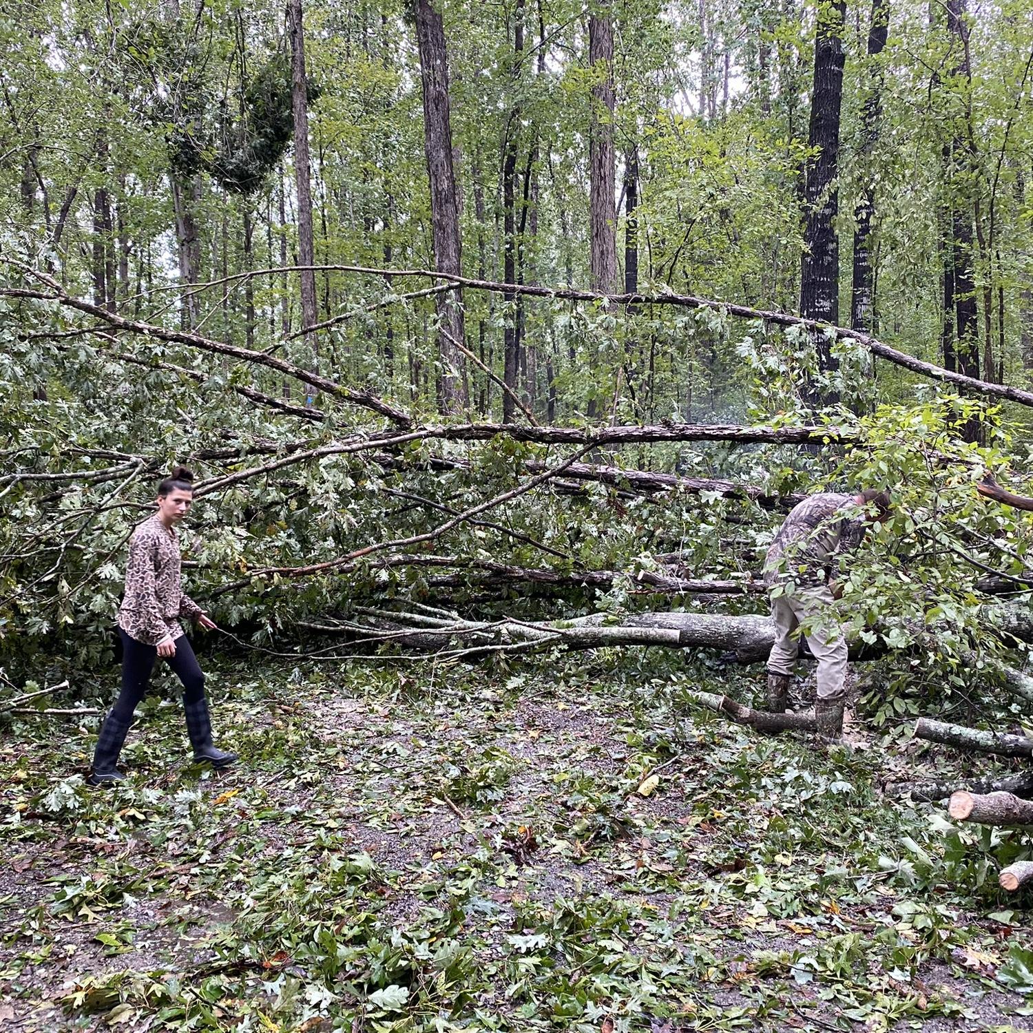 Hurricane Helene aftermath, Kris, Kendall, and I clearing the driveway