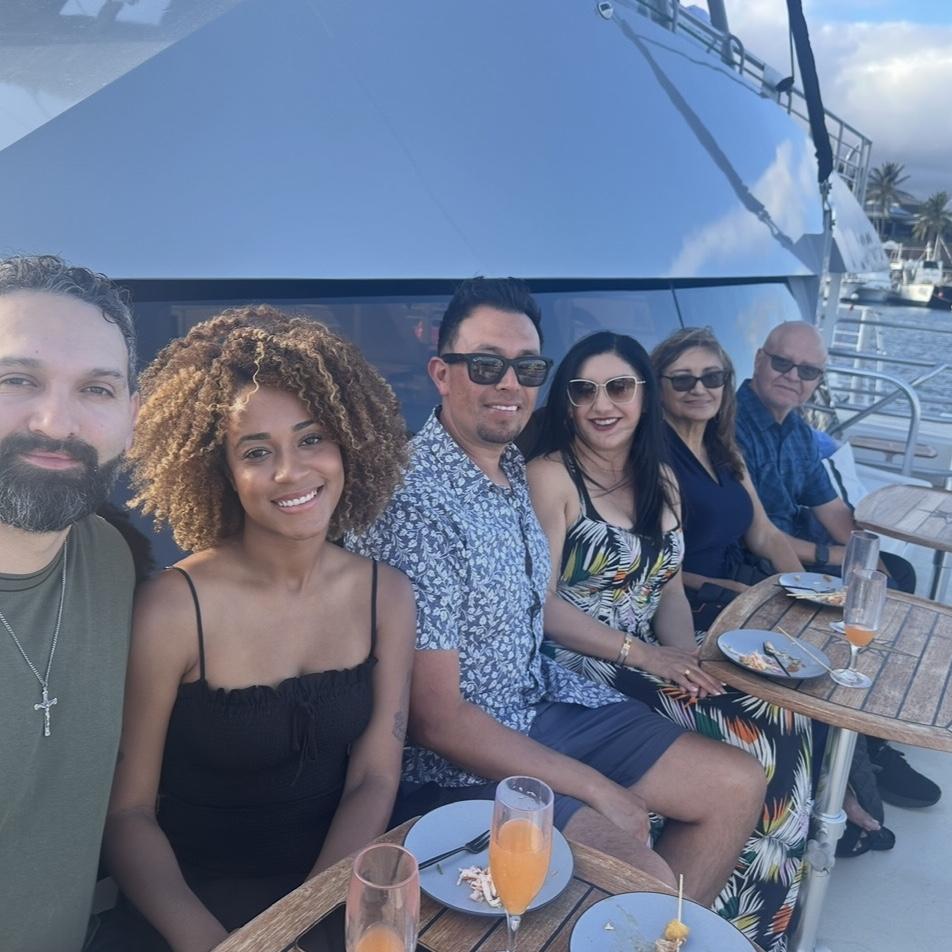 Enjoying a day out on the boat: Abraham, Aliyah, Tony, Jessica, Alice and Lucio