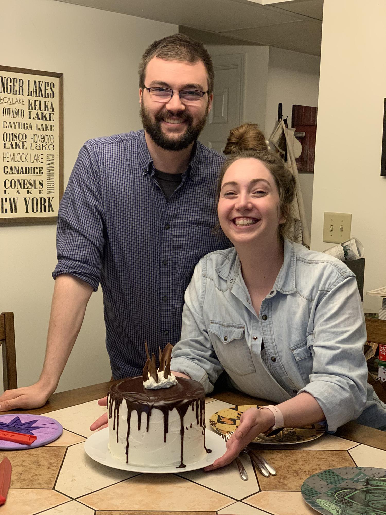 Moments before the proposal.  Featuring the delicious cake.