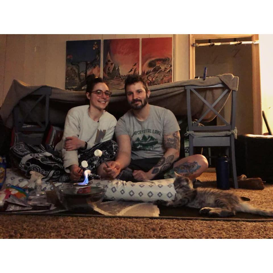 Our little family enjoying a fort and indoor s'mores