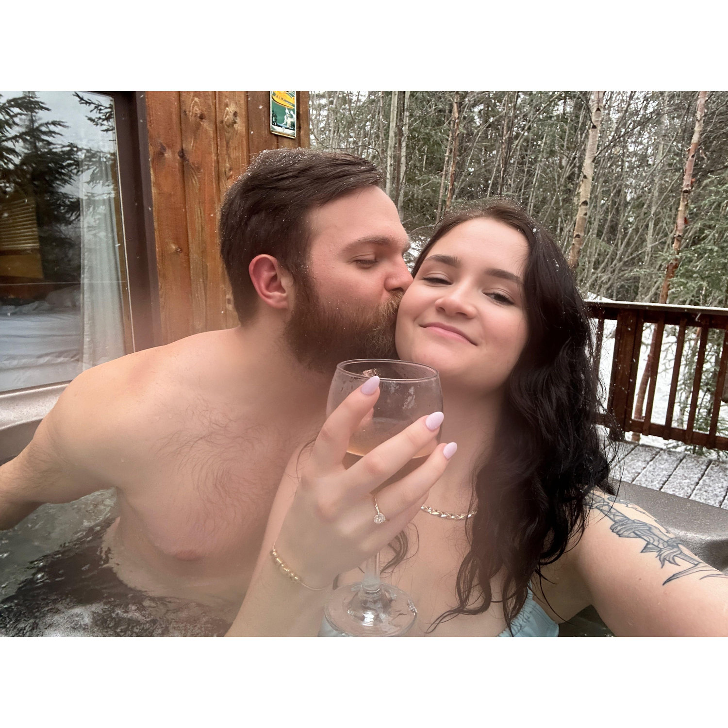 The best thing to do in Alaska right after getting engaged? Hot tub and wine!