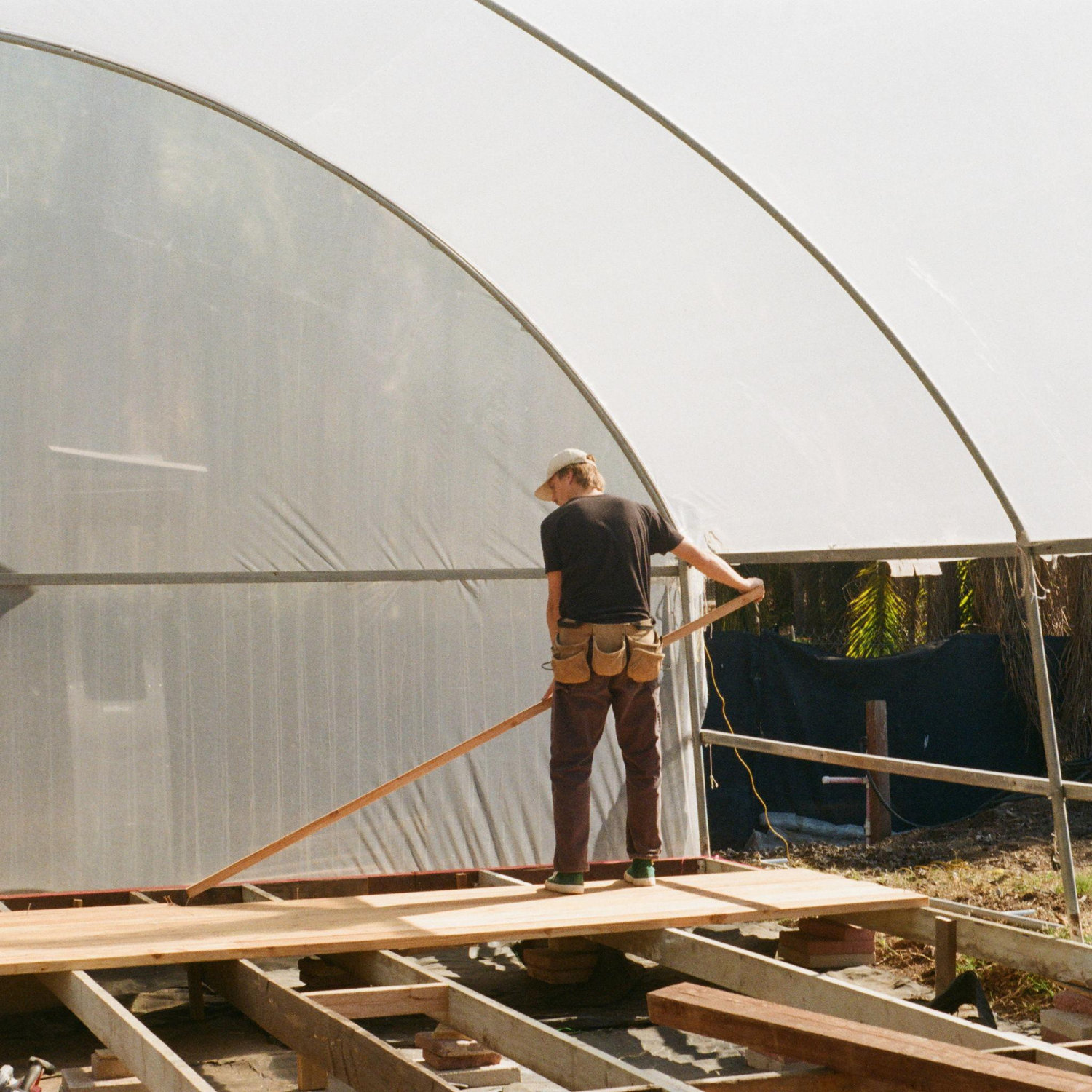 Workin' on the greenhouse in Cali!