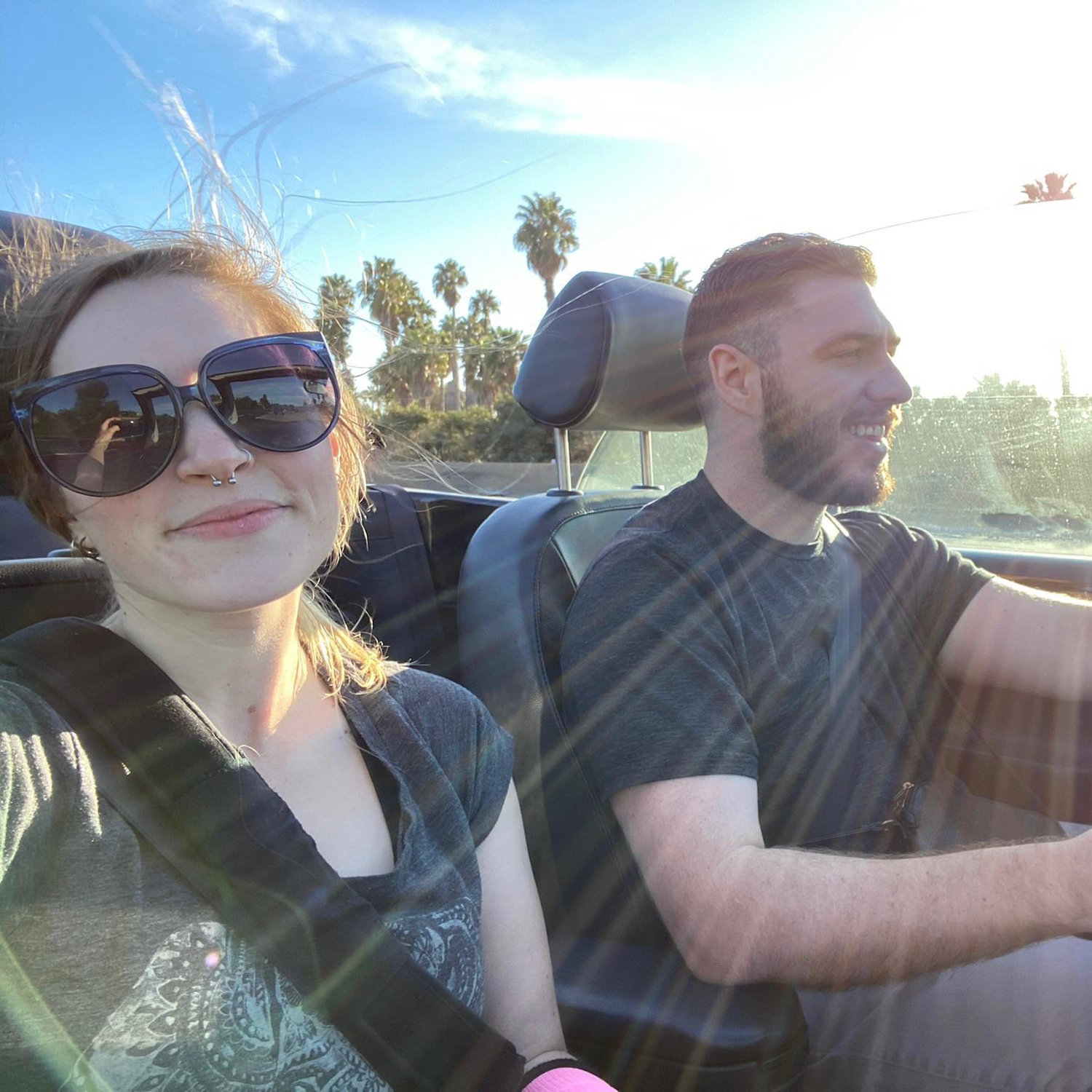 Patrick thinking, "I could get used to this" as we drove through San Diego with the top down on the convertible.