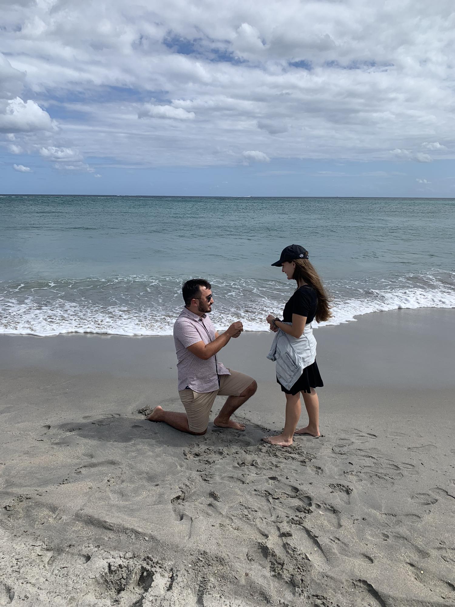 Josh proposed on the beach with our families and some close friends present.