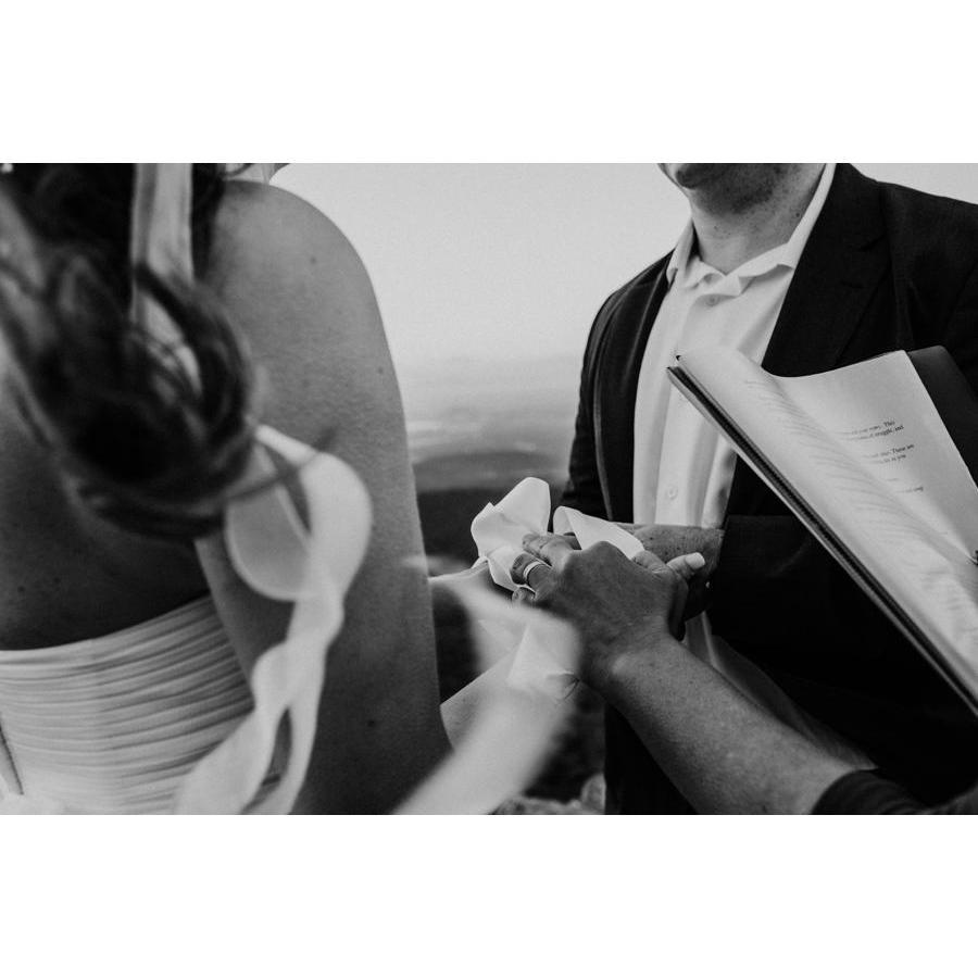 This was during our ribbon binding moment.  After we admitted we were truly afraid we were going to fall off the cliff because the wind had gotten so bad and our eyes were closed.