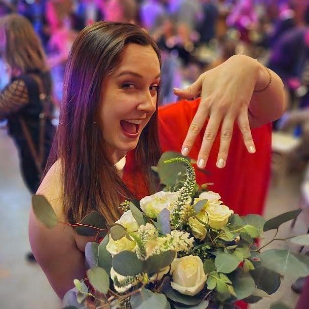 Conveniently, Sydney caught the bouquet at Andrea & Ryan's wedding... on accident of course