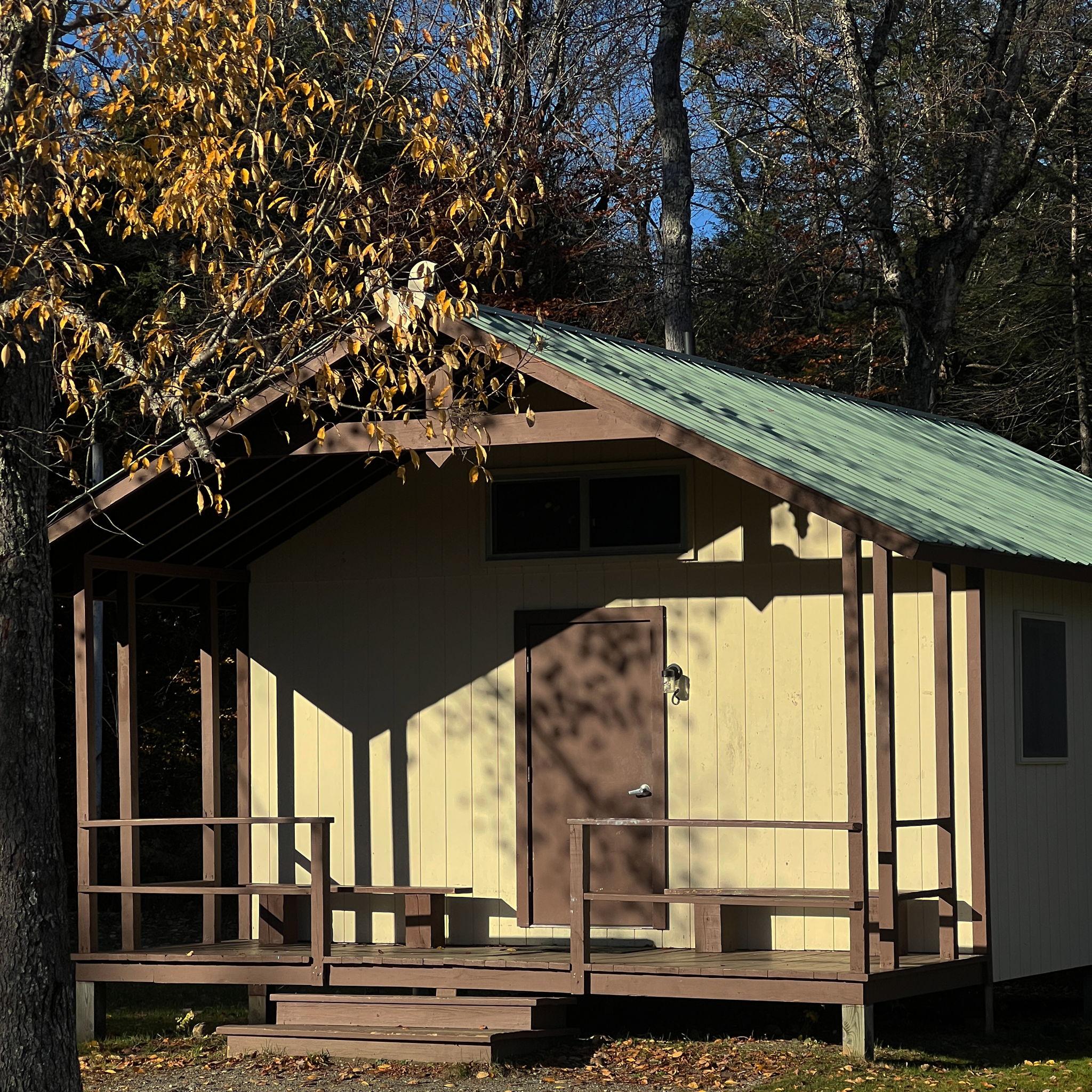 Camp Neringa cabin exterior in October