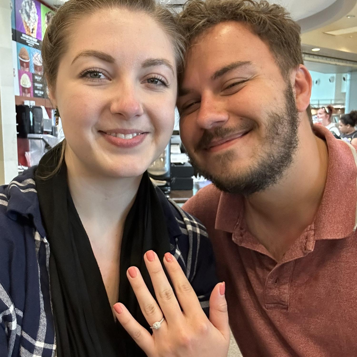At the airport heading back to Chicago with the newly-engaged glow!