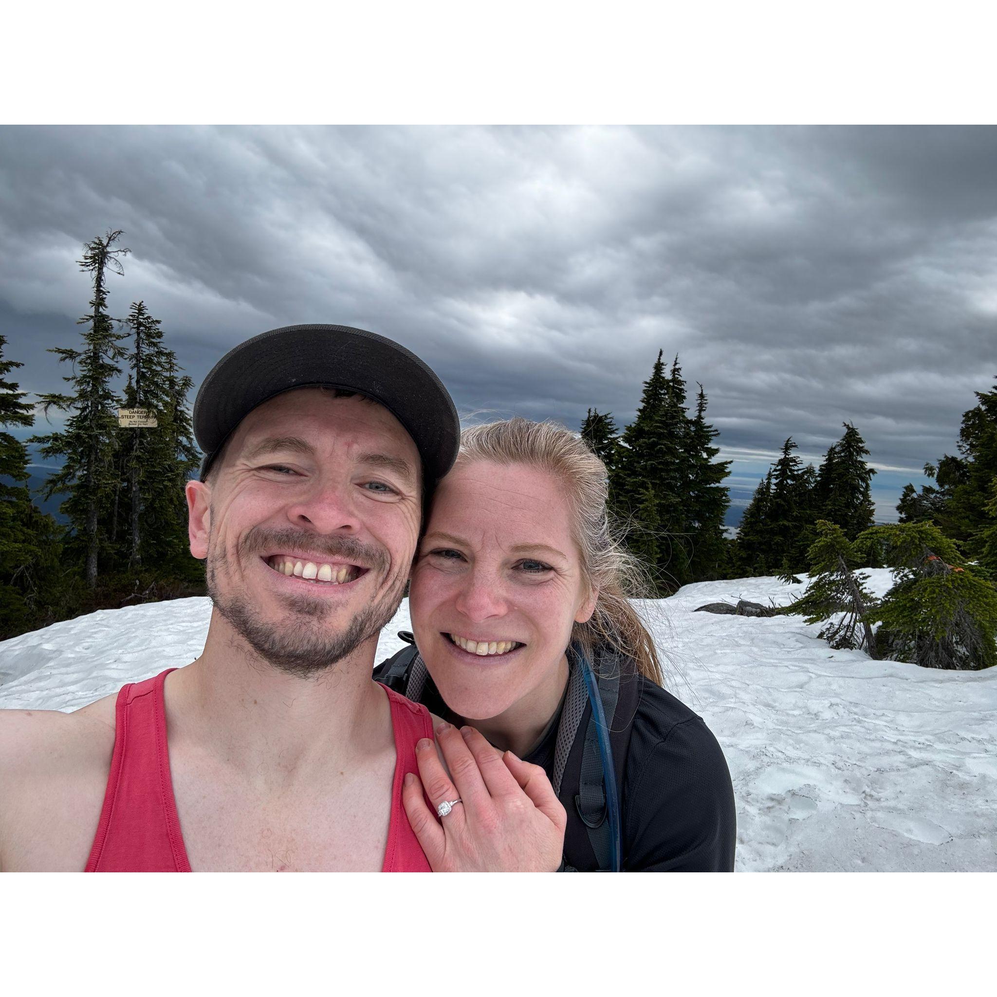 We got engaged... on top of a mountain... in the freezing cold... very ill prepared and under-dressed. Wouldn't change a thing about it.
