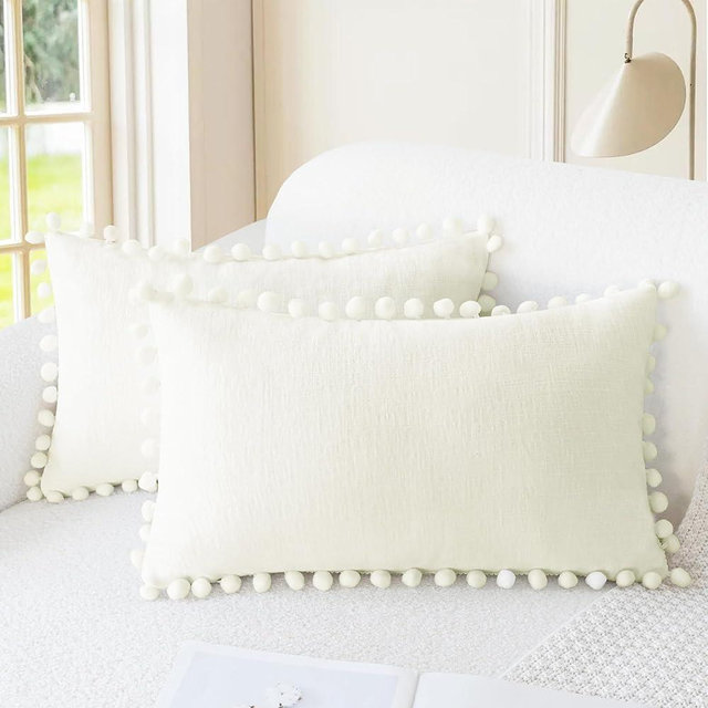CaliTime Throw Pillow Covers Decorative 20 X 12 Inches Pack of 2 Cozy Solid Dyed Soft Chenille Cushion Cases with Pom Poms for Couch Sofa Bed Living Room Home Cream
