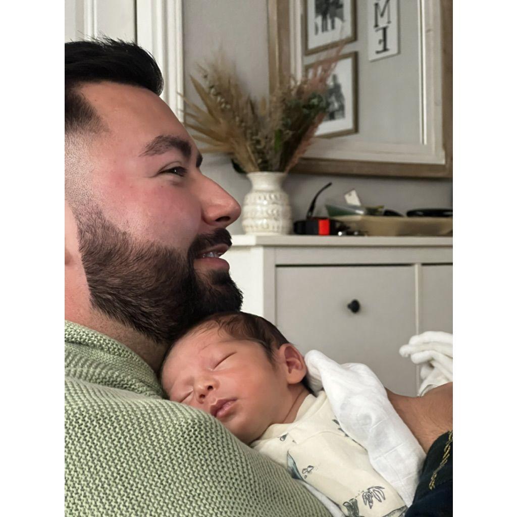 Tio Isaac's first cuddle with Mateo