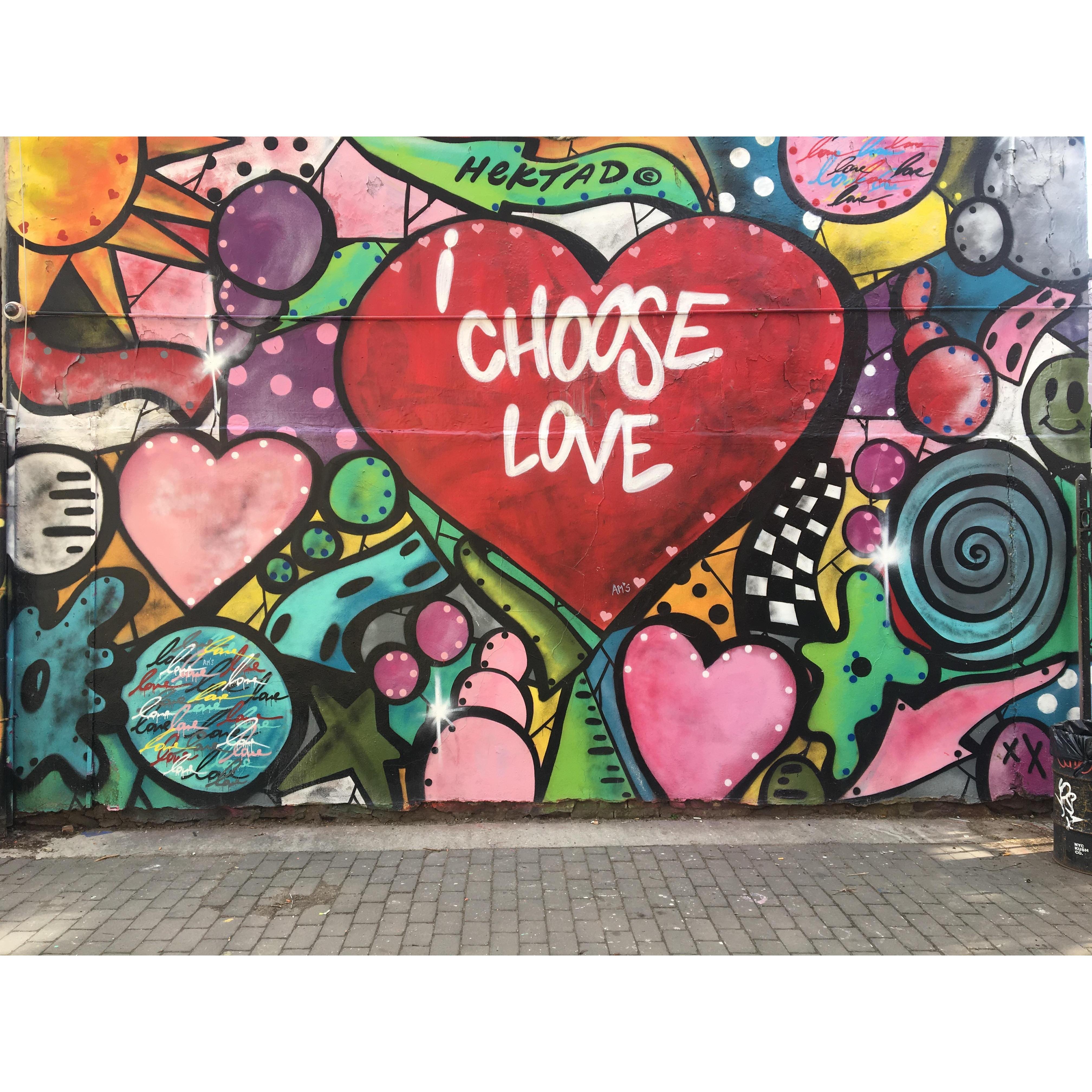 Derek planned to propose at a restaurant, but while scouting he discovered this graffiti mural and went with this location.  The art work is by the artist Hektad, now we notice his work around NYC.