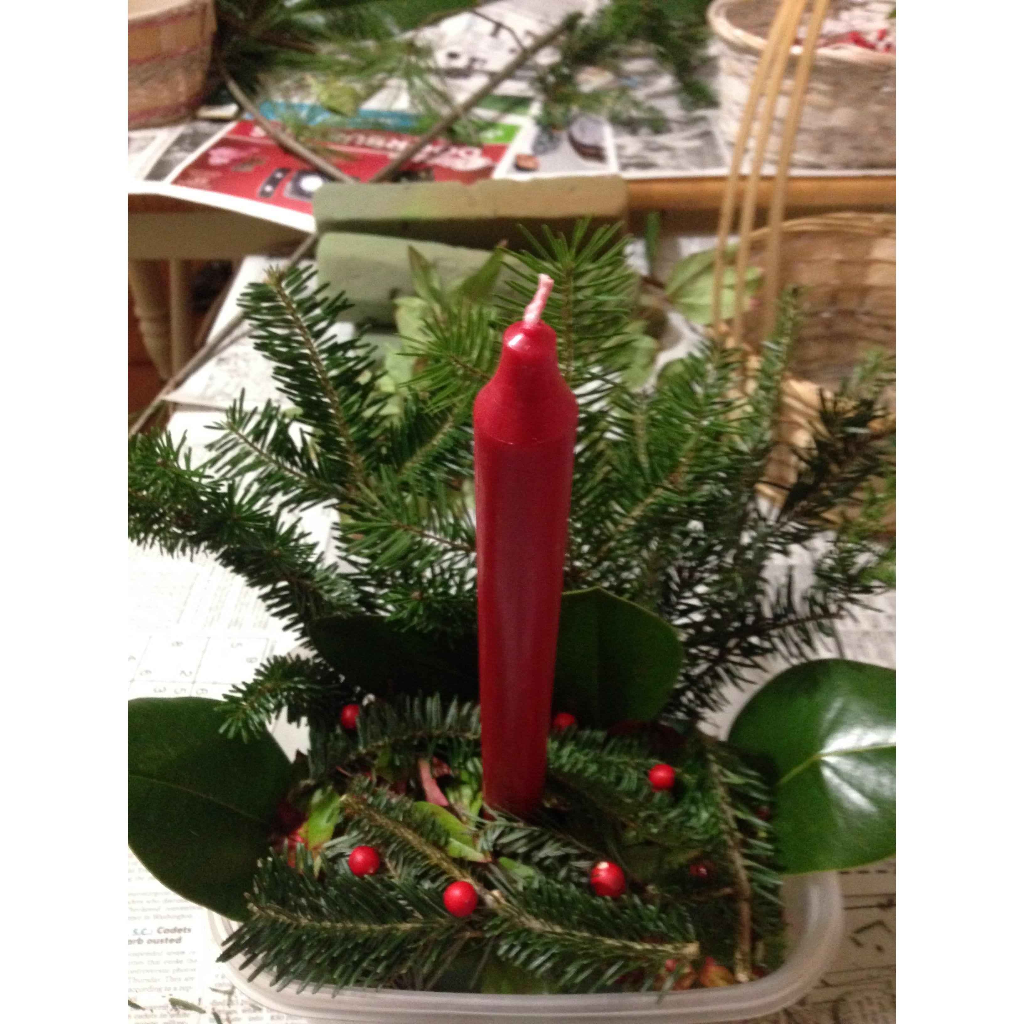 Our first Christmas season together. Nathan's family has a tradition of making centerpieces for the table. Jessie didn't do half bad for her first time making one.