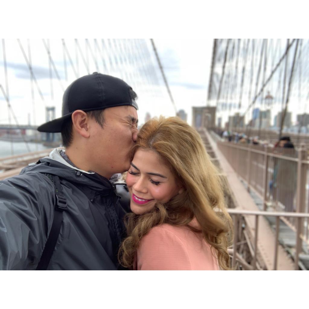 Enjoying Brooklyn Bridge. Someone obviously loves someone else more..