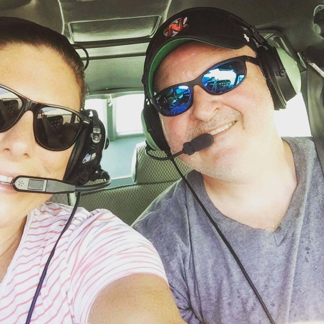 Captain Sean at the controls, while Jessica gets her first flying lesson. By the end of the flight she didn't want to give the airplane controls back so Sean could land it.