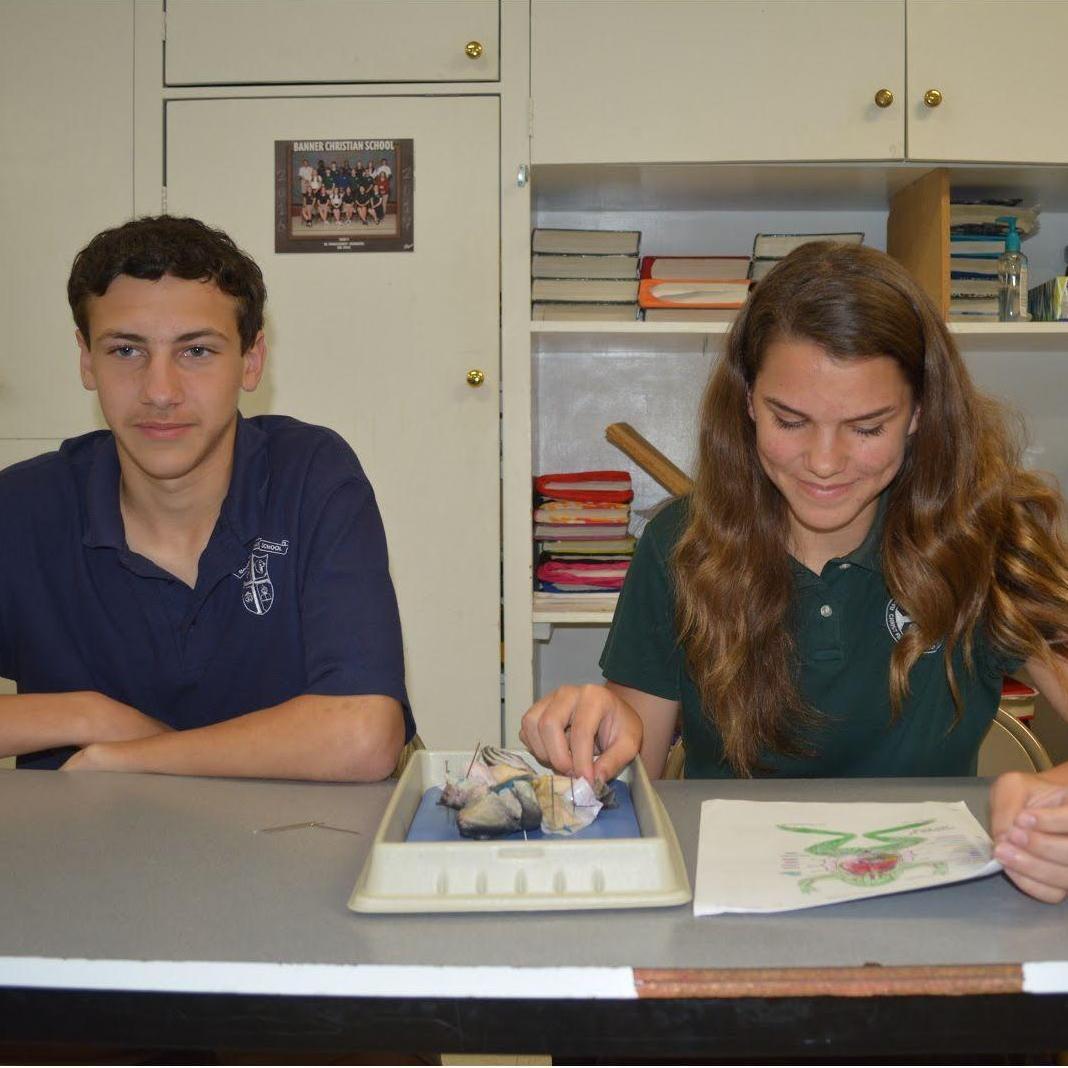 We chose each other as partners for our 9th grade frog dissection in Biology. As you may see, I am doing all the work as per usual.