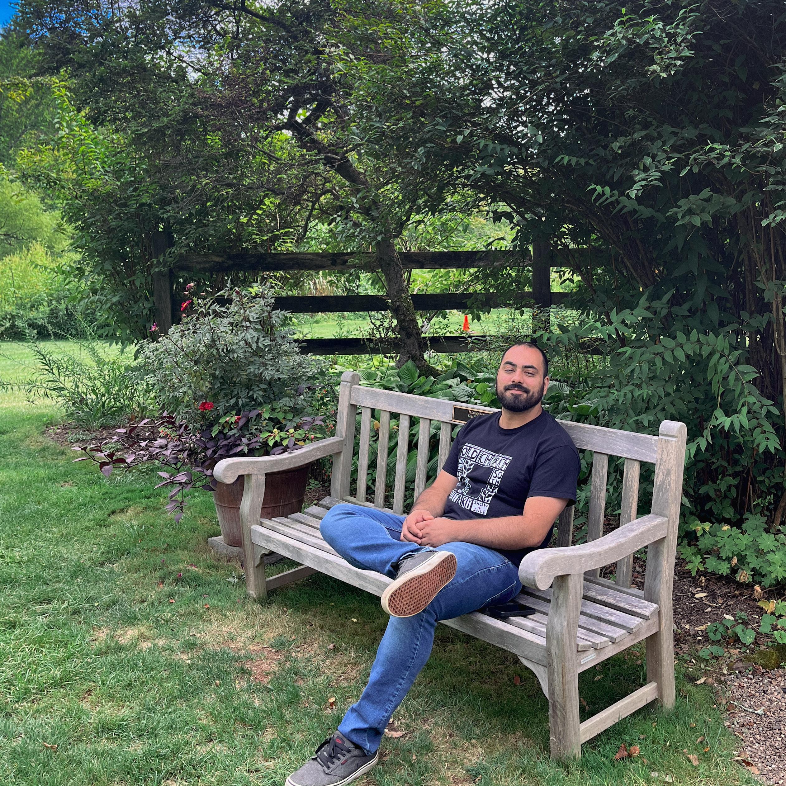 Emiliano sitting where we got engaged. 2025.