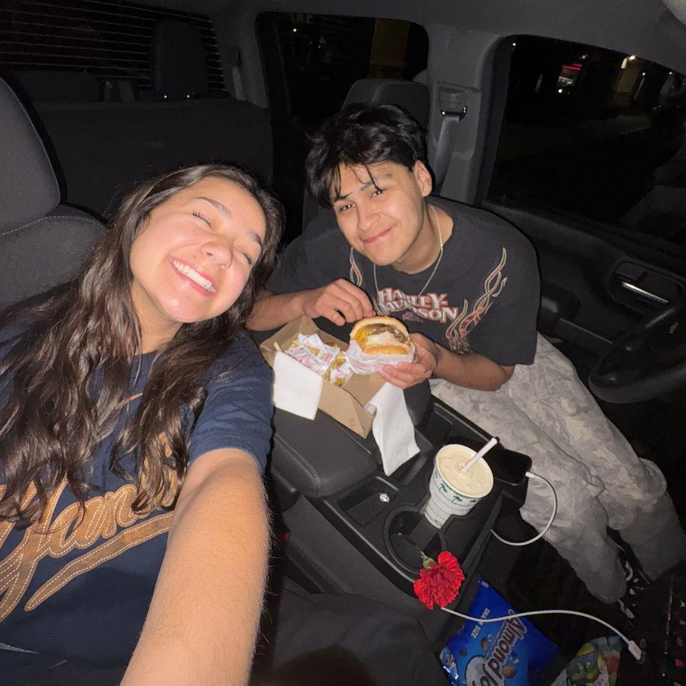 His smile is for his burger, not Ava lol